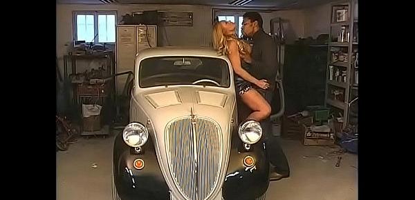  Classy woman banged by black mechanic in a nice old car